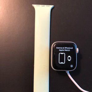 Apple Smart Watch Series 4 with charger-light green band